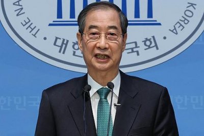 ​韩国前国务总理韩德洙接受特检组传唤调查