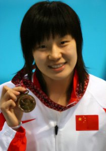 ​周雅菲：获了97枚金牌，被称为“蝶后”，转身嫁给二婚丧妻的莫科